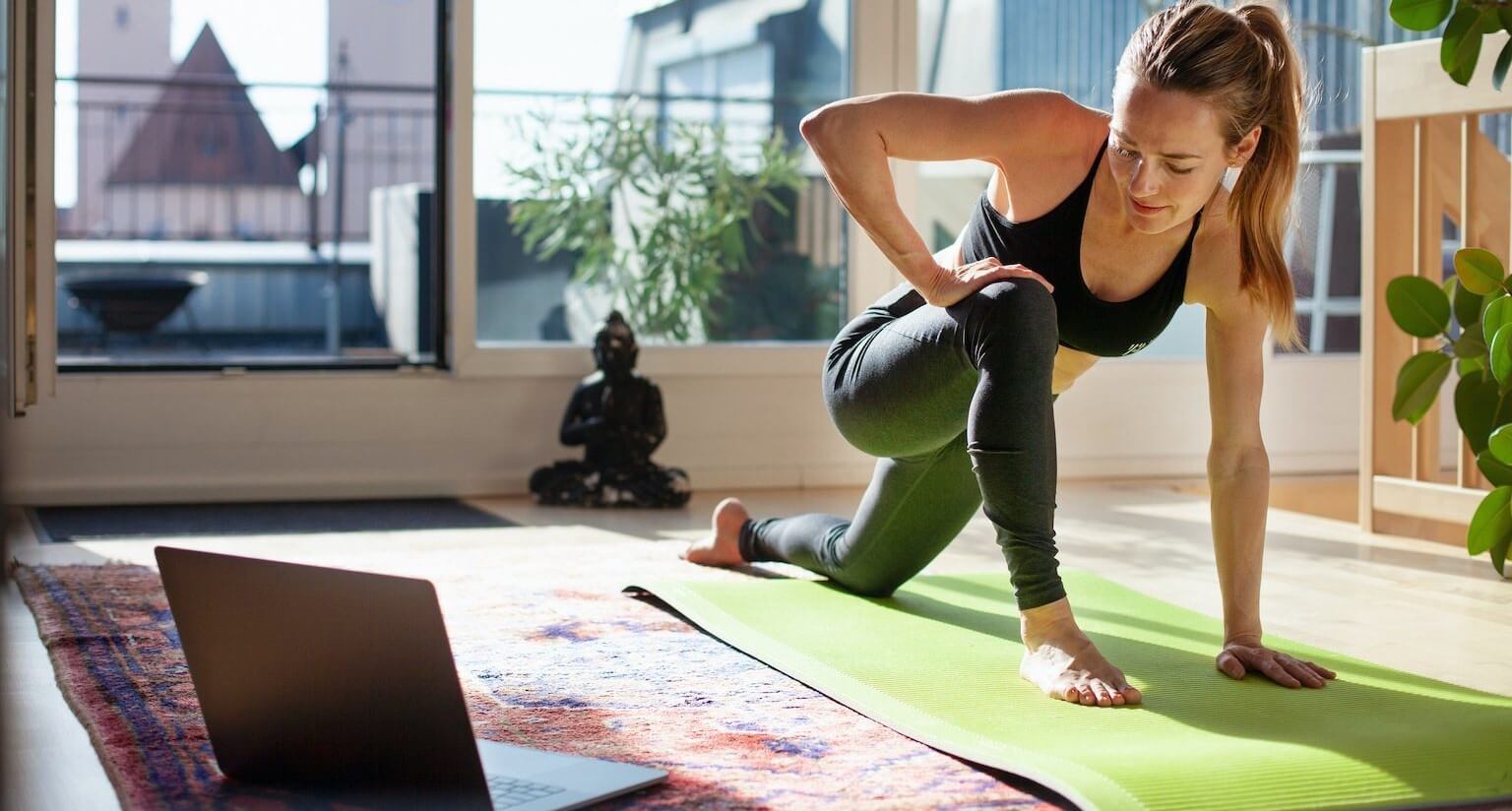 Woman doing yoga at home